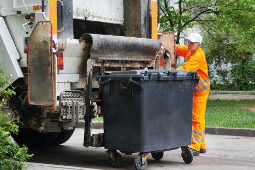 Construction site waste being loaded for disposal
