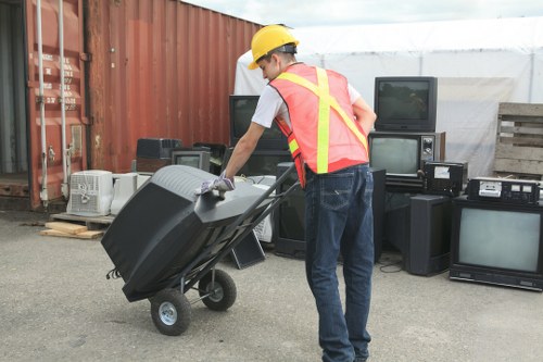 Professional rubbish removals services at work